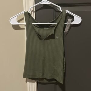 Green tank top. Price is negotiable